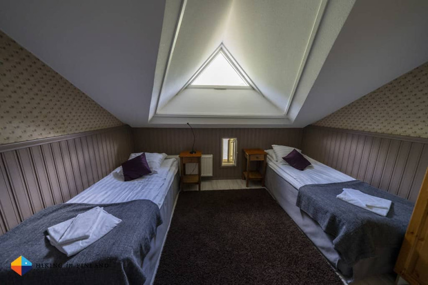 Summer in Lapland - Summer in Lapland: Experience Mountain Biking & Hiking in Levitunturi Hullu Poro Apartment Bedroom with two single beds - Levi, Lapland, Finland.