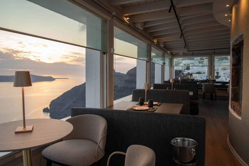 View onto the sea from the inside of the Mylos Champagne Bar Restaurant in Santorini, Greece.