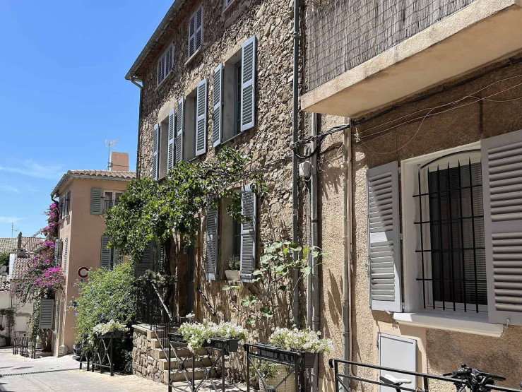 Colorful houses and fine alleys in St. Tropez on the Cote d Azur in France.