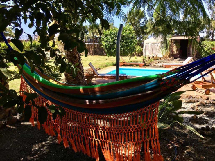 Hammock and pool at the Villa Azul Experience in Fuerteventura, Spain.