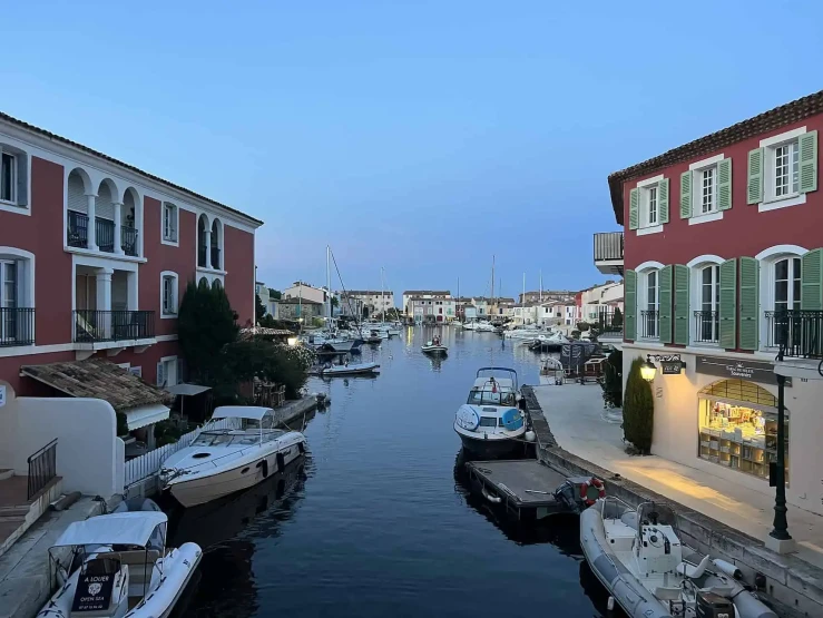 Restaurants, stores and boats right outside the door. Port Grimaud on the Cote d Azur in France.