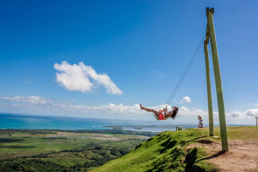 Whales in Samaná Bay - The Enchanting Migration of Humpback Whales in Samaná Bay, Dominican Republic Super swing on top of Montana Redonda in the Dominican Republic.