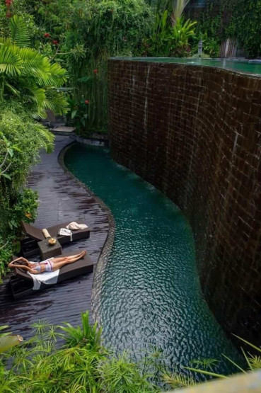 yoga retreats in Bali - Unforgettable Yoga Retreats in Bali Pool of the De Moksha Eco Friendly Boutique Resort in Tanah Lot in Bali, Indonesia.