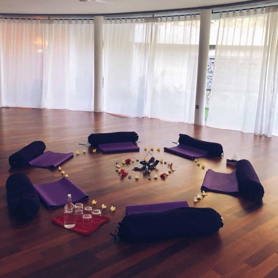 yoga retreats in Bali - Unforgettable Yoga Retreats in Bali Yoga room at the De Moksha Eco Friendly Boutique Resort in Tanah Lot in Bali, Indonesia.