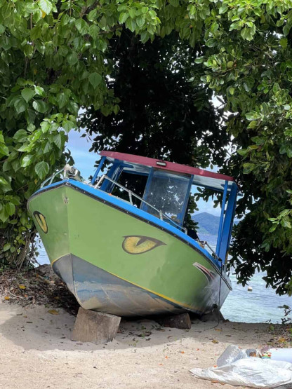 seychelles travel tips - Top Seychelles Travel Tips: Not to Miss Islands and Beaches Painted colored boat. Boat love in the Seychelles.