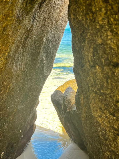 seychelles travel tips - Top Seychelles Travel Tips: Not to Miss Islands and Beaches Saint Anne - granite rocks with a view of the turquoise sea.