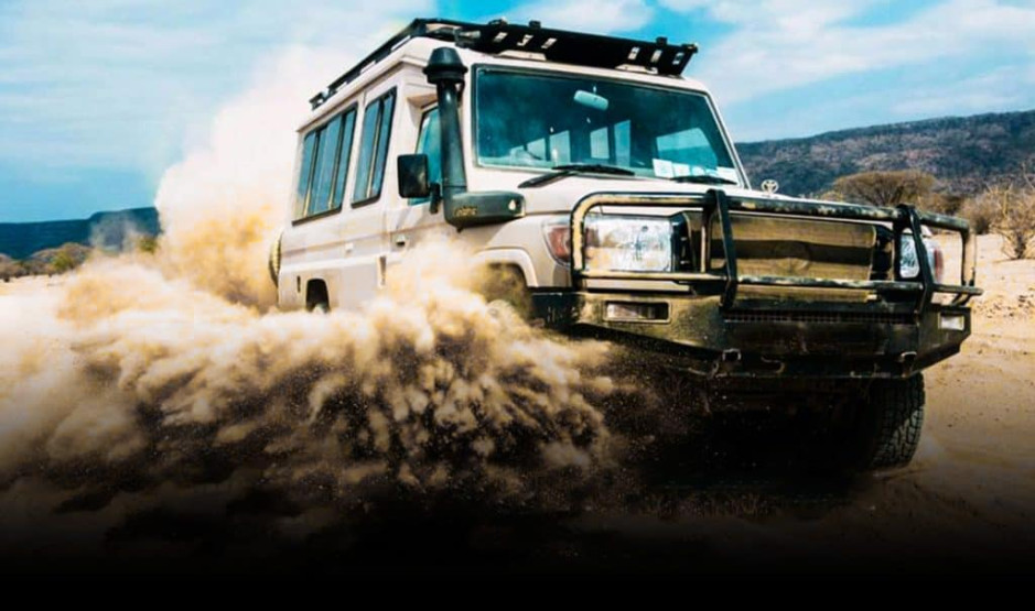 Tanzanian safari - 10 Reasons a Tanzanian Safari Should be on Your Bucket List A safari vehicle in Tanzania.