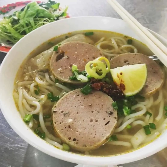 Breakfast in Ho Chi Minh - Where to Get Breakfast in Ho Chi Minh Beef noodle soup Bún bò Hue in Ho Chi Minh City, Vietnam.
