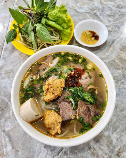 Breakfast in Ho Chi Minh - Where to Get Breakfast in Ho Chi Minh Bún bò, Hue - Beef noodle soup in Ho Chi Minh City, Vietnam.