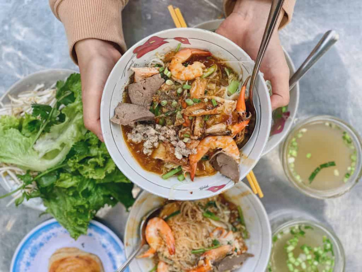 neighborhoods in Ho Chi Minh - A Foodie Guide to the Different Neighborhoods in Ho Chi Minh City Food Bowl in the Binh Thanh district in Ho Chi Minh City, Vietnam.