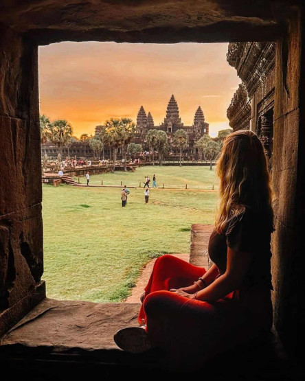 Best Way to See the Angkor Wat Temples - What is the Best Way to See the Angkor Wat Temples? Selfie at a "window" during sunset in Angkor Wat, Cambodia.