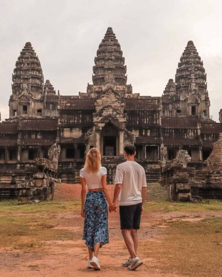 Best Way to See the Angkor Wat Temples - What is the Best Way to See the Angkor Wat Temples? Typical social media zombie pic, walking towards a temple in Angkor Wat, Cambodia.
