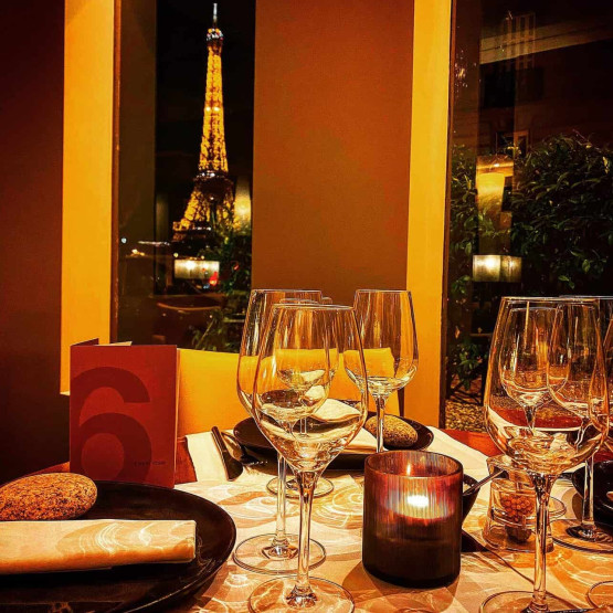 View of the Eiffel Tower - Top Paris Restaurants with a View of the Eiffel Tower Dinner with Eiffel Tower view at the 6 New York in Paris, France.