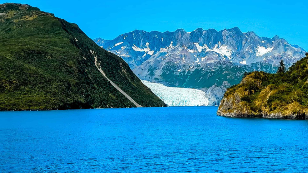 Day Cruise at Kenai Fjords National Park - The Magic of a Day Cruise at Kenai Fjords National Park, Alaska Slate Island on the right before heading to the Aialik glacier in the Kenai Fjords National Park in Alaska, USA.