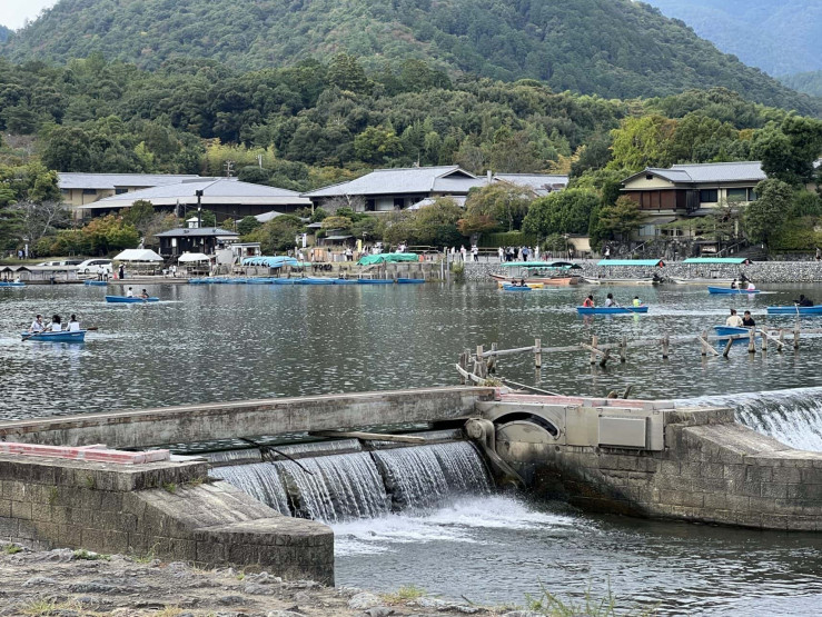 Travel Tips for Tokyo and Kyoto - Top Travel Tips for Tokyo and Kyoto River with boats in Arashyama in Kyoto, Japan.