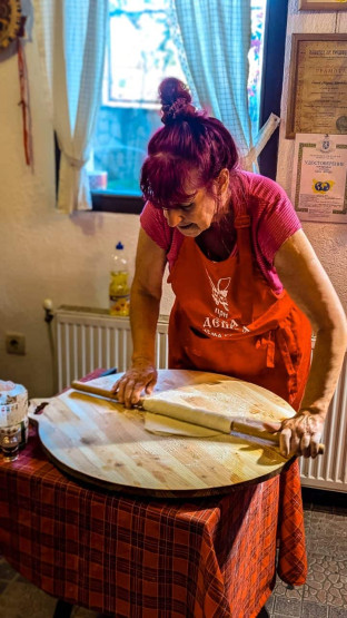 Creating a traditional meal at Gorno Draglishte - Local Folkloric Experience with Food Tasting, Bansko, Bulgaria.