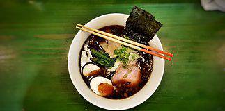 Most Popular Japanese Dishes to Try Ramen noodles at the Ramen museum in Yokohama, Japan.
