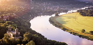 Dresden Elbland: Where Baroque Meets Urbanity and Nature Abounds Dresden with a view towards Saxon Switzerland. In the foreground the three Elbe castles (Albrechtsberg Castle, Lingnerschloss and Eckberg Castle) and the Blue Wonder. Photo: ddpix.de (DML-BY); Germany