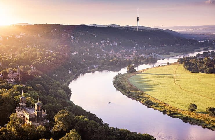 Dresden Elbland: Where Baroque Meets Urbanity and Nature Abounds Dresden with a view towards Saxon Switzerland. In the foreground the three Elbe castles (Albrechtsberg Castle, Lingnerschloss and Eckberg Castle) and the Blue Wonder. Photo: ddpix.de (DML-BY); Germany