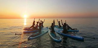 Unique Things to do in Barcelona Stand-up paddle yoga in Barcelona