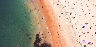 Australia Entry Restrictions: How to Not Get Denied Birdsview of an Australian beach.