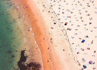 Australia Entry Restrictions: How to Not Get Denied Birdsview of an Australian beach.