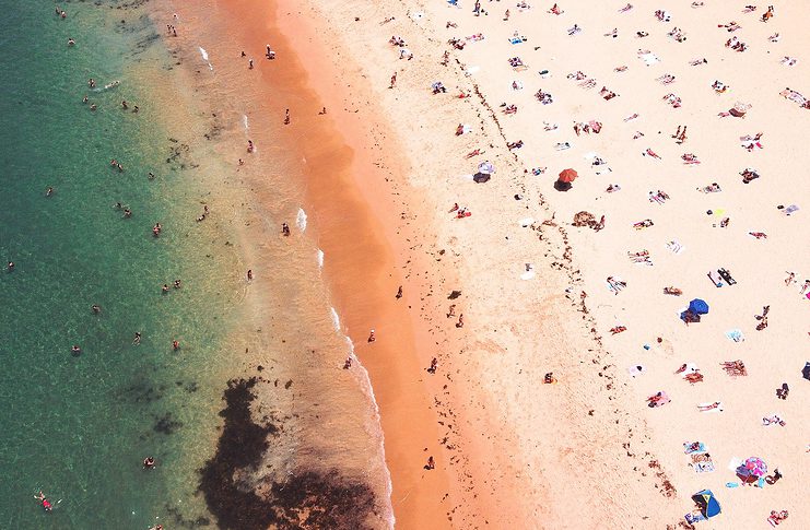 Australia Entry Restrictions: How to Not Get Denied Birdsview of an Australian beach.