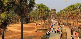 Visiting Siem Reap, Cambodia A stunning sight, seeing a hot air balloon floating above the temple complex. Visiting the temples of Angkor Wat, Cambodia.