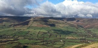 4 Must-Visit Towns in the Peak District Views over the Peak District countryside from Mam Tor, United Kingdom.