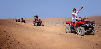 Hurghada Desert Safari: What to Expect on a Quad Bike Adventure Exploring the desert on a quad bike tour.