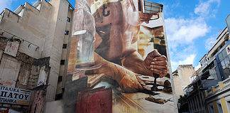 A Guide to Street Art in Athens A craftsman painted at a building in Athens, Greece.