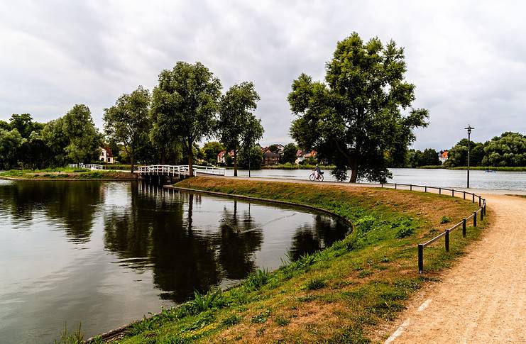 A Sustainable Mecklenburg-Vorpommern Travel Guide Scenic view of Knieperteich lake in Stralsund.