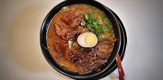 The Different Flavors of Japan: What Makes Japanese Cuisine so Special Ramen soup with egg for lunch at Ajisen Ramen in Japan.