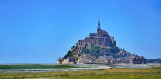 Visit Mont Saint Michel: A Small UNESCO World Heritage Island in the Normandy, France Cathedral Mont Saint Michel in the Normandy, France.