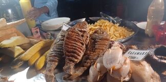 Forodhani Garden: Where Zanzibar’s Heart Beats Fish at a food stall at Forodhani Garden in Stone Town, Zanzibar, Tanzania.