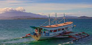 How to Get to Honda Bay Palawan: Travel Tips & Routes Banca boat, Palawan, Philippines. Photo by Ray in Manila -flickr