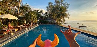 Hotel Booking Hacks: Expert Tips to Save Big on Your Next Stay Hotel pool in Koh Phangan, Thailand.