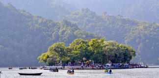 Things to Do in Nepal Besides Trekking Island on Phewa Lake in Pokhara, Nepal.