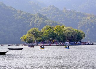 Things to Do in Nepal Besides Trekking Island on Phewa Lake in Pokhara, Nepal.