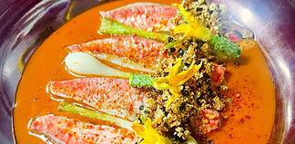 Good Restaurants Near Major Attractions in Paris Red mullet in crispy seaweed breadcrumbs, vegetable tian & fish soup at Tomy&Co in Paris, France.