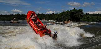 How to Go White Water Rafting in Jinja, Uganda Rafting in the rapids on the river Nile in Jinja Uganda.