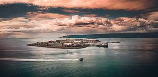 One of the Best Small Towns in Alaska? Homer is my Pick Homer Spit at sunset - Photo by Homer Chamber of Commerce.