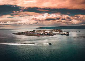 One of the Best Small Towns in Alaska? Homer is my Pick Homer Spit at sunset - Photo by Homer Chamber of Commerce.