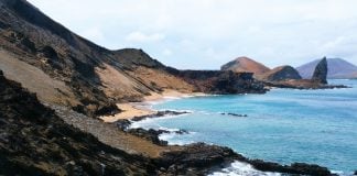 How to Travel Sustainably in the Galapagos Islands Coast of the Galapagos Islands in Ecuador. Photo via Nathalie Marquis via unsplash.