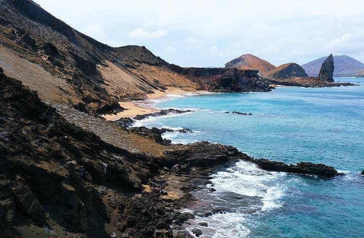 How to Travel Sustainably in the Galapagos Islands Coast of the Galapagos Islands in Ecuador. Photo via Nathalie Marquis via unsplash.