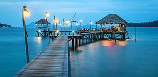 Painting a Wedding in Thailand: a Canvas for the Most Visual Love Stories on Earth A jetty of a resort in Thailand.