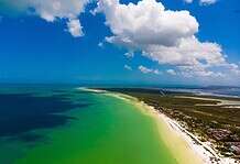 Cancun’s Island Get Away: Discover the Best Routes from Cancun to Holbox and Isla Mujeres Drone pic of the beach of Holbox in Quintana Roo, Mexico.