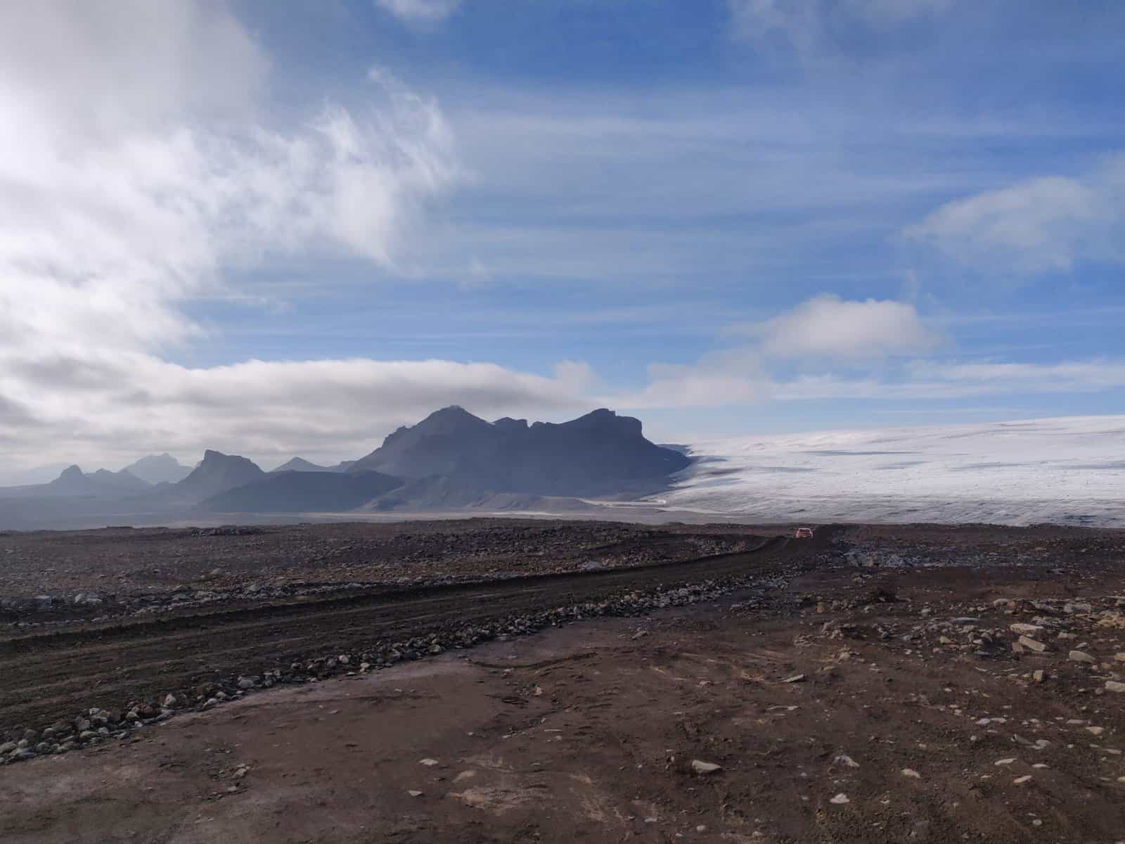 Icelandic Glaciers - Exploring Icelandic Glaciers: Your Guide to the Kjölur Route in the Southeast Highlands Gravel road Skálpanesvegur F336 with view to Langjökull Glacier one of the iconic Icelandic glaciers