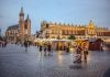 Your First Time in Kraków – What You’ll Remember Most The town square in Krakow, Poland.