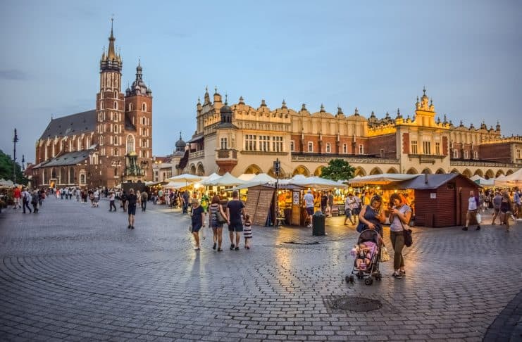 Your First Time in Kraków – What You’ll Remember Most The town square in Krakow, Poland.